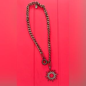 Melania Clara gun metal star burst necklace. Magnetic clasp